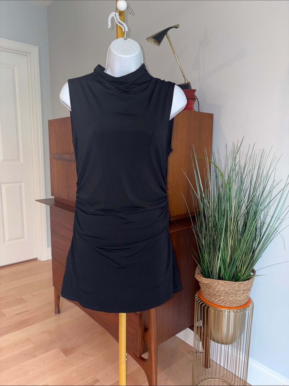 C. Wonder Black Sleeveless Tunic Top